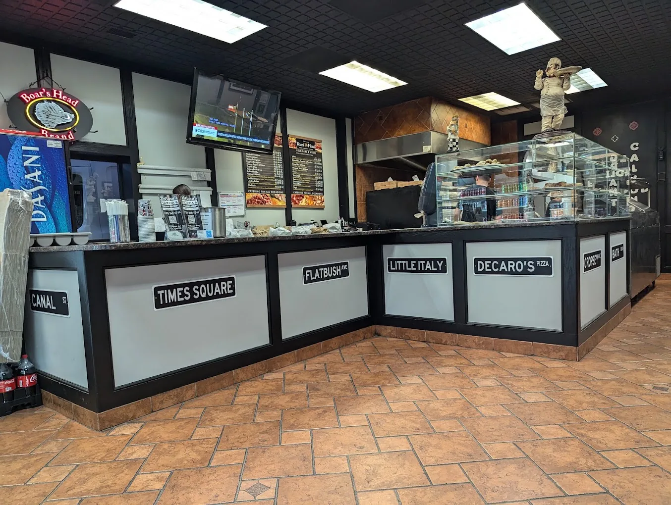 The counter and dining room inside DeCaro's